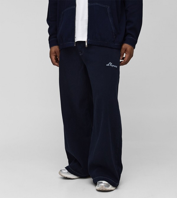 L'Homme Embroidered Stitch Baggy Fit Jeans