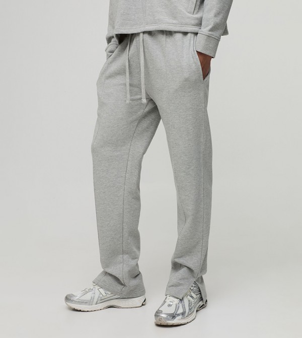 Tonal Embroidered Split Hem Sweatpants