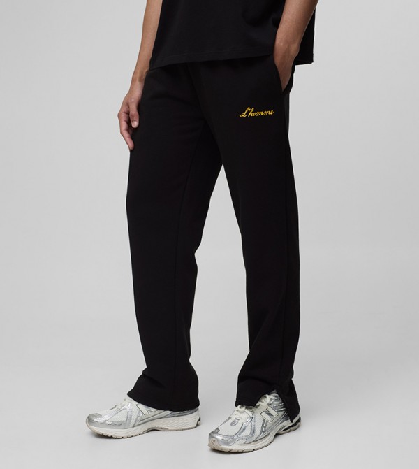 L'Homme Embroidered Split Hem Sweatpants