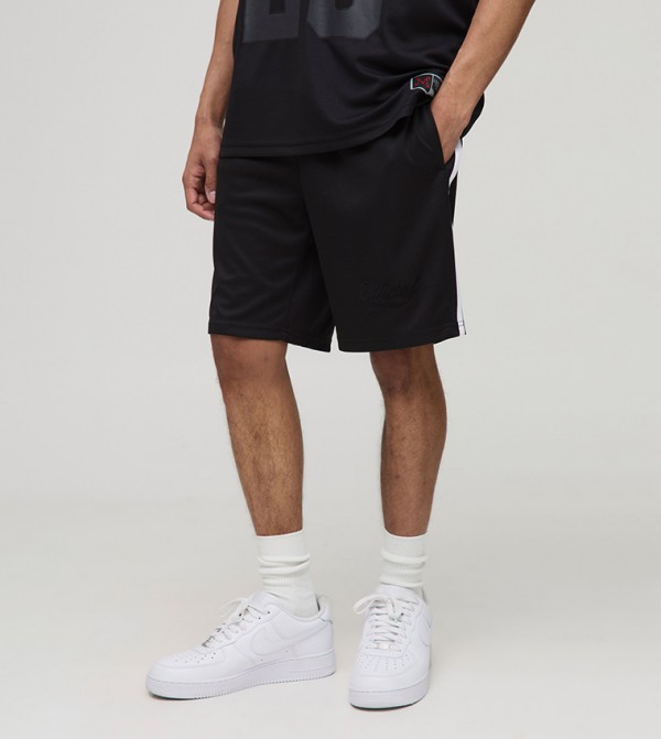 شورت كرة سلة شبكي بطبعة 