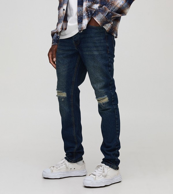 Rigid Subtle Ripped Knee Vintage Slim Fit Jeans