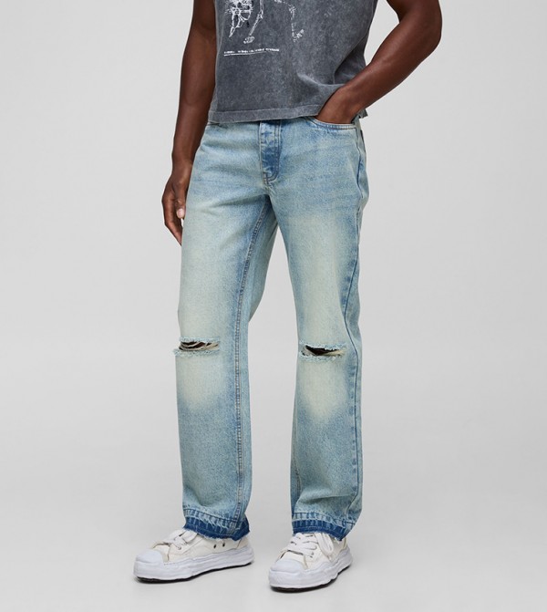 Ripped Knee Straight Fit Jeans with Let Down Hem