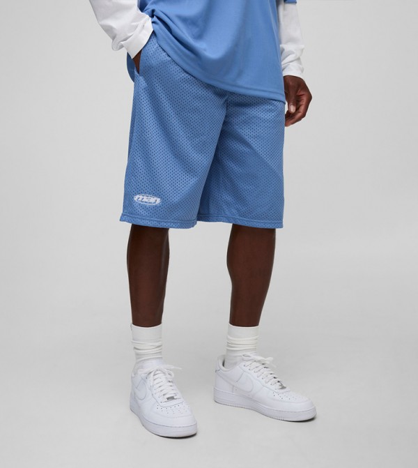 شورت شبكي واسع بطول متوسط 