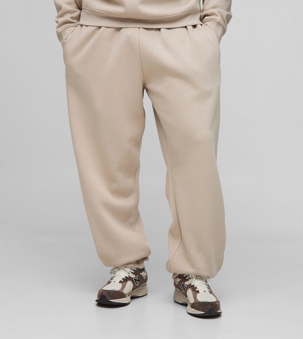Solid Mid Rise Relaxed Fit Joggers