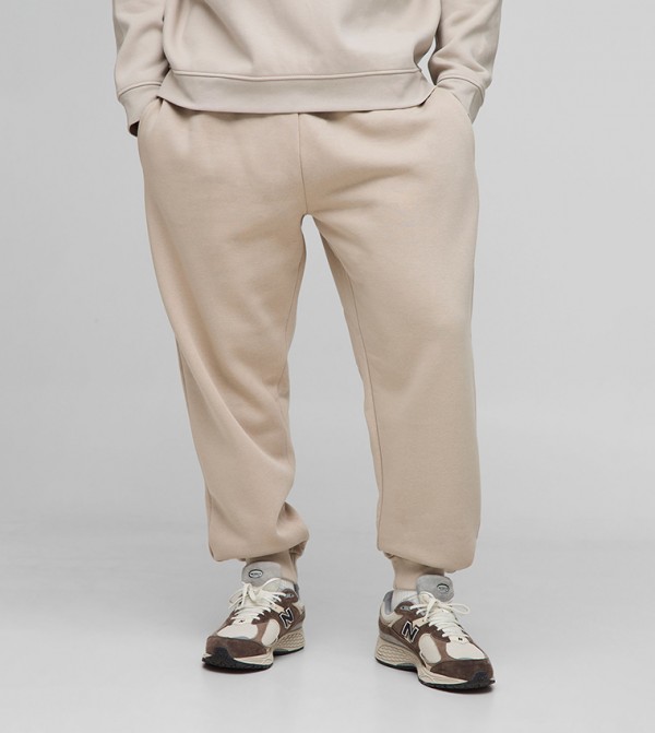 Solid Mid Rise Relaxed Fit Joggers