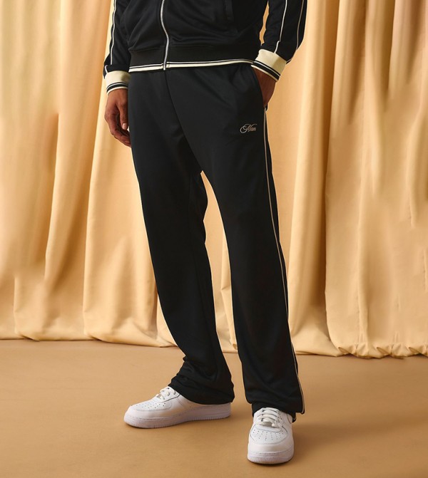 Slim Stacked Flare Embroidered Stripe Tricot Track Pants