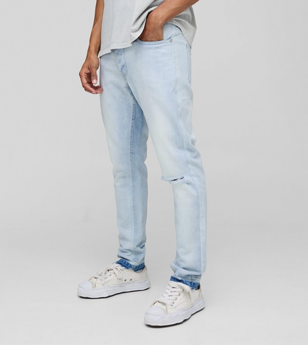 Slim Fit Subtle Ripped Tinted Jeans with Let Down Hem
