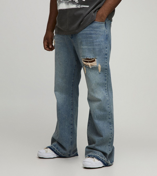 جينز فلير للمقاسات الكبيرة والطويلة 