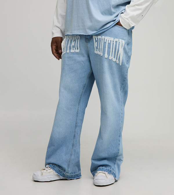 Raw Hem Applique Gusset Flared Jeans