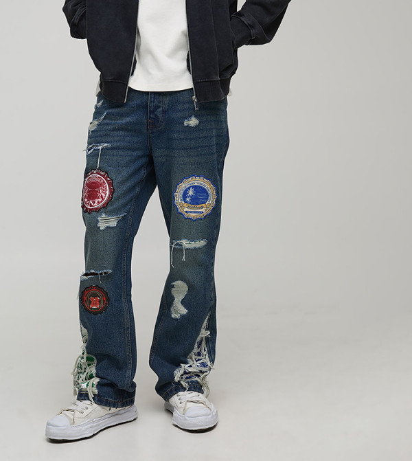 Appliqued Badge Gusset Slim Flared Jeans