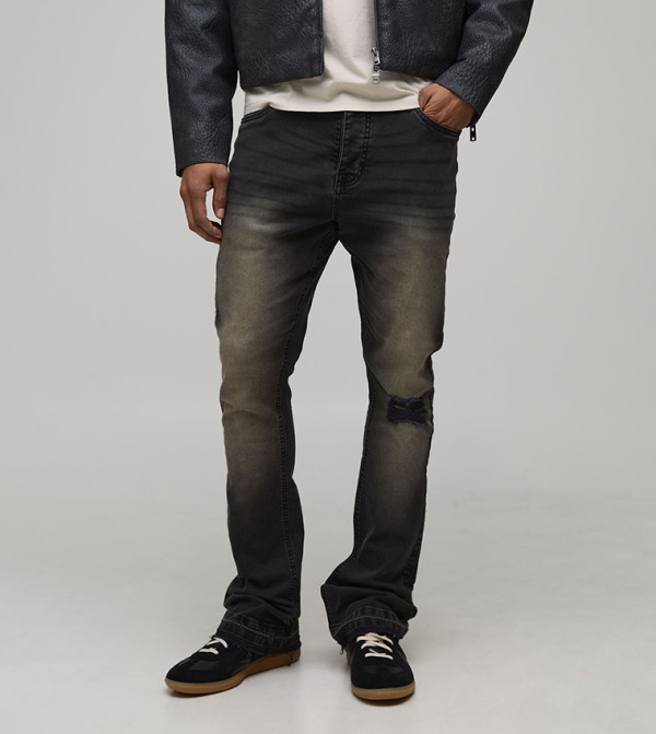 Skinny Flared Stacked Jeans with Knee Rip