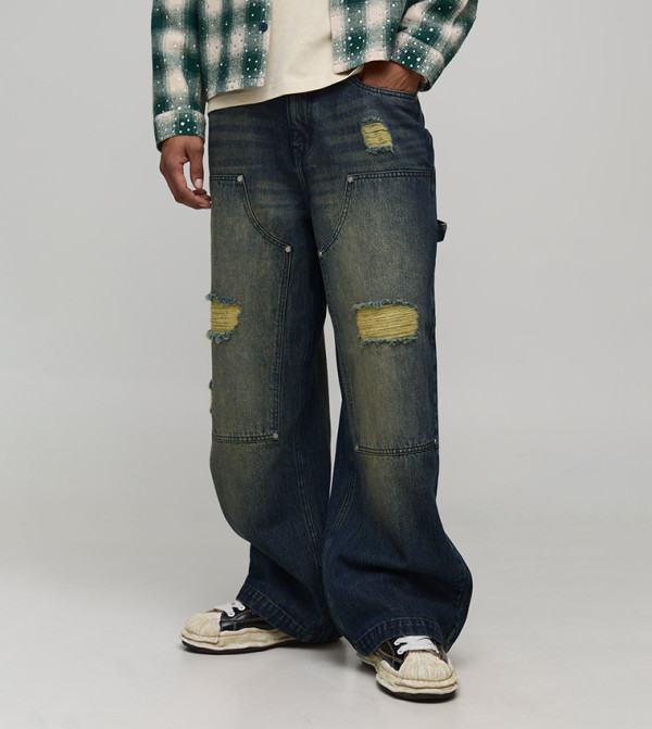 جينز واسع مغسول ممزق 