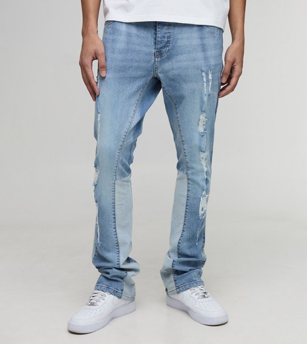 بنطلون جينز واسع ممزق