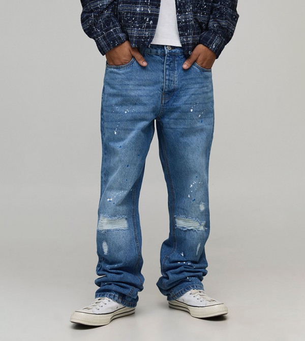 Knee Rip and Repair Paint Splatter Slim Flared Jeans