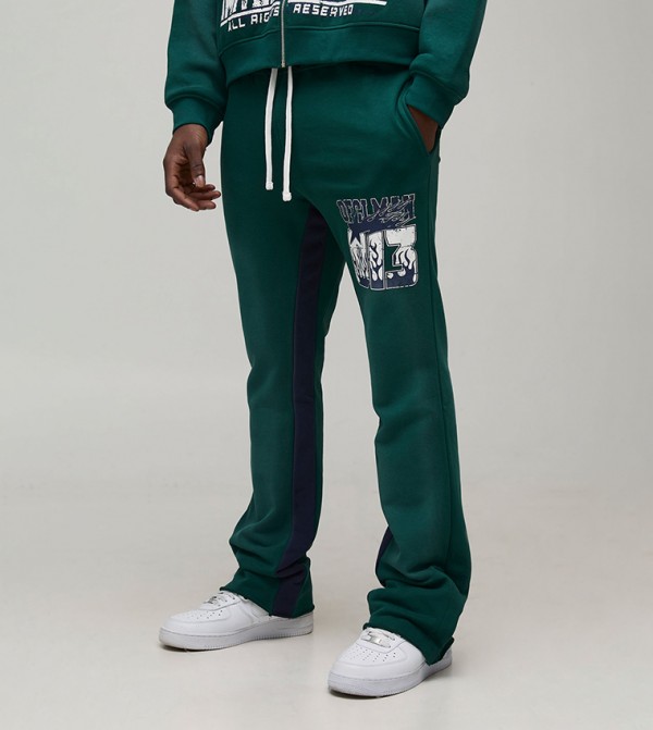 Ofcl Spray Wash Stacked Flared Sweatpants