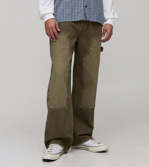 جينز مغسول بقصة مريحة 