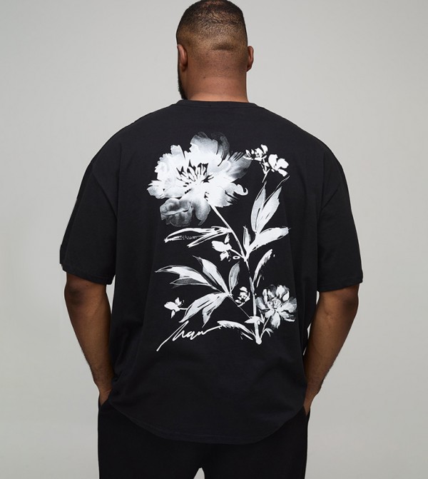 تيشيرت اوفرسايز بطبعة ورود 