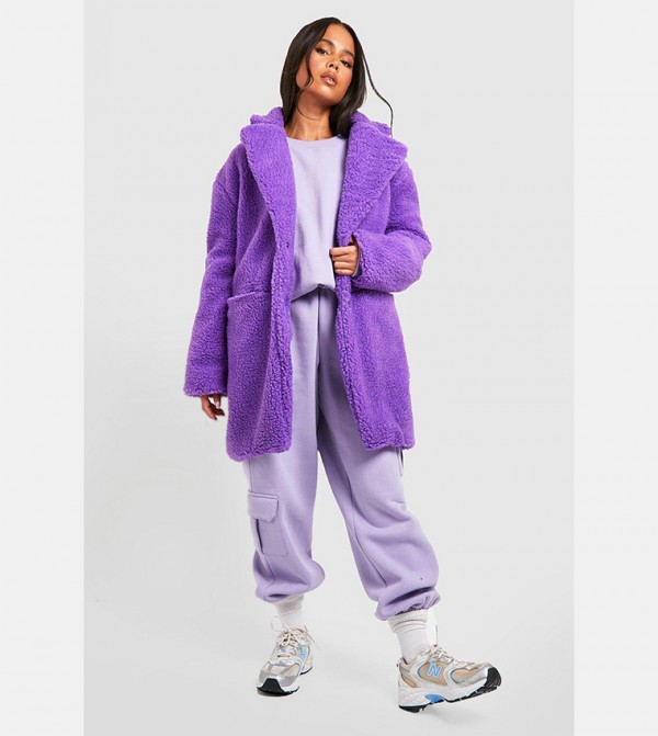 Buy Boohoo Pocket Detail Teddy Fur Coat In Purple 6thStreet Oman