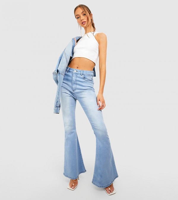 Buy Boohoo Bum Shaping High Rise Flared Jeans In Blue | 6thStreet Oman