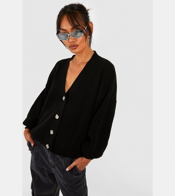 Oversized cardigan clearance button