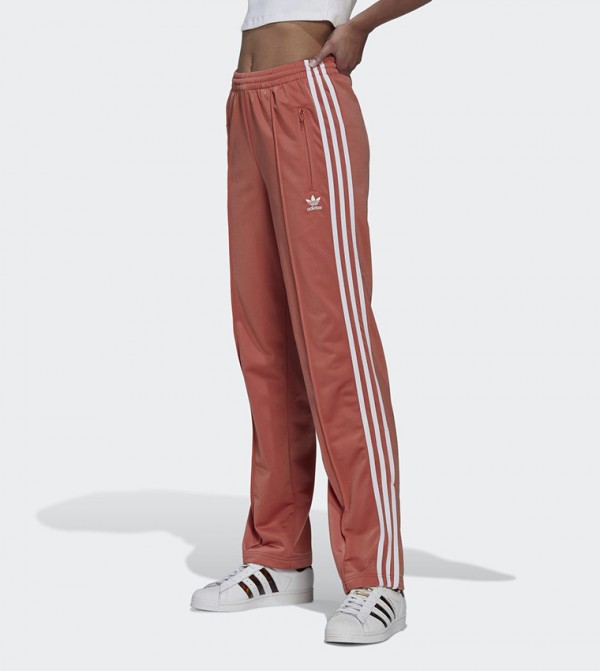 Dust pink adidas track pants sale