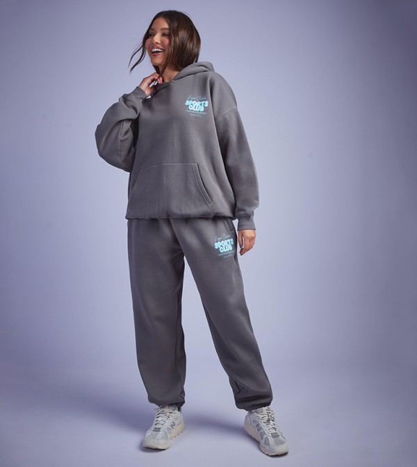 Dsgn Studio Sports Bubble Slogan Cuffed Oversized Joggers