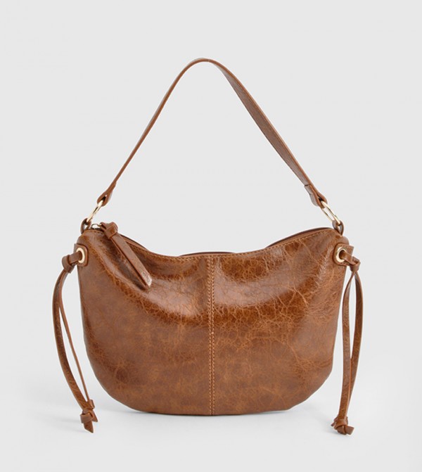 Distressed Leather Round Tassel Shoulder Bag