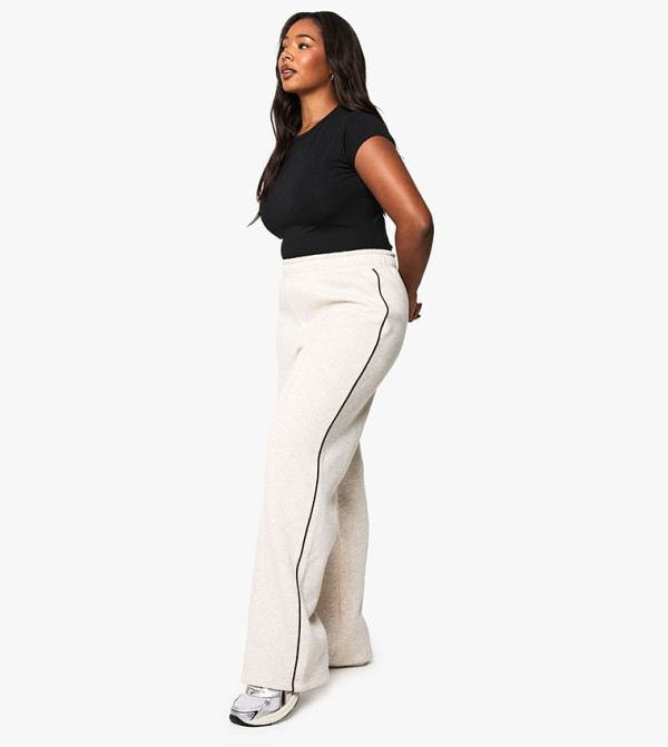 بنطال رياضي بقصة مستقيمة وتفاصيل حواف للمقاسات الكبيرة