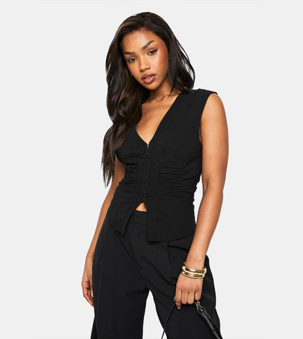 توب مزموم بلا أكمام 