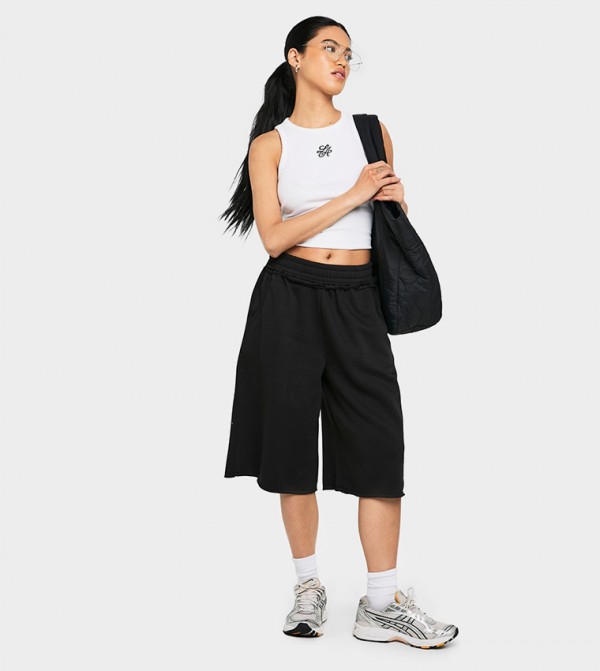 Exposed Seam Raw Hem Bermuda Shorts