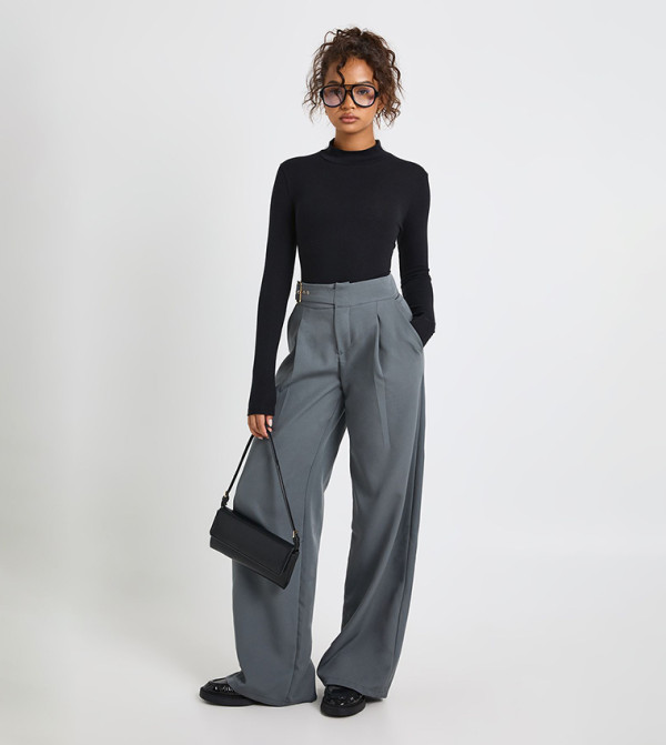 بنطال بخصر منخفض وحزام للمقاسات الطويلة