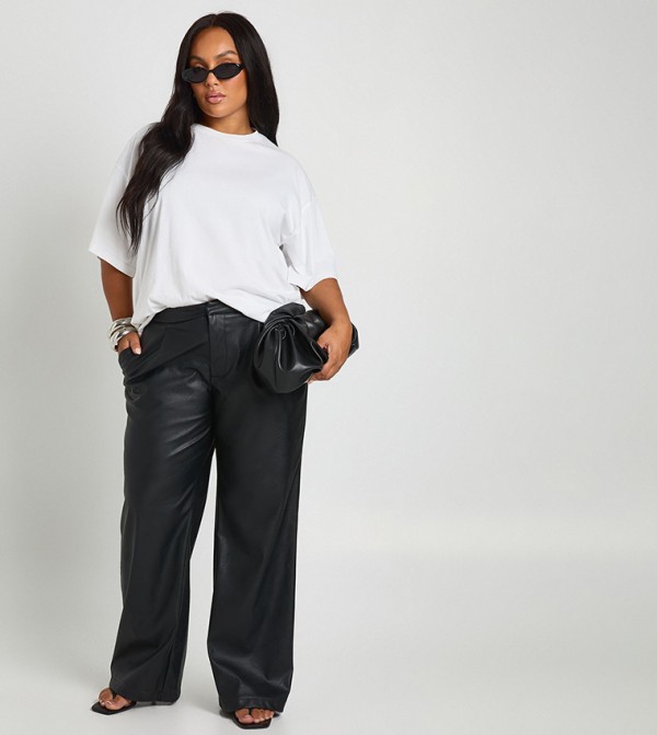 بنطال واسع جلد صناعي بكسرات للمقاسات الكبيرة 