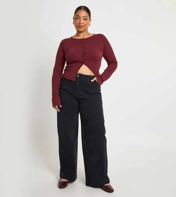 بنطلون جينز واسع بخصر مرن وجيوب للمقاسات الكبيرة