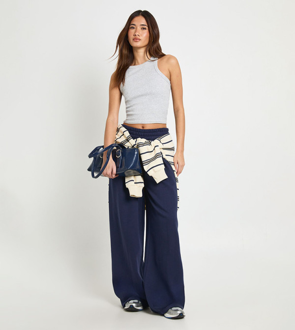 بنطلون رياضة واسع بخصر عالي وكسرات