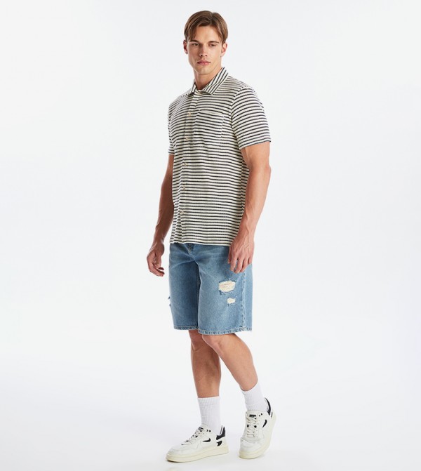 Ripped Mid Rise Denim Shorts