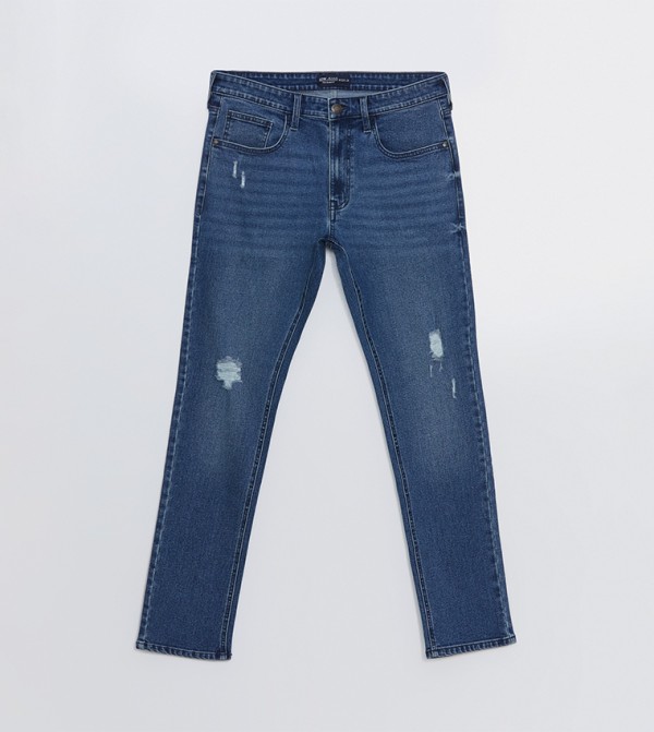 750 Distressed Slim Fit Jeans