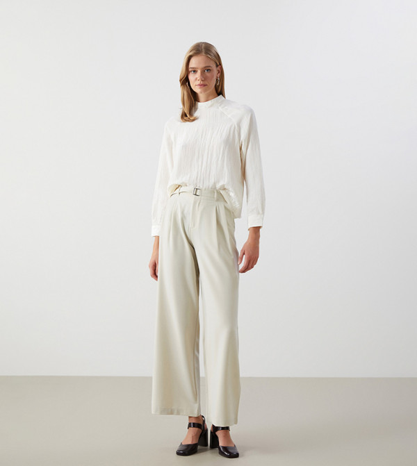 Buy LC Waikiki Belted Wide Leg Trousers In Beige | AIVI Qatar
