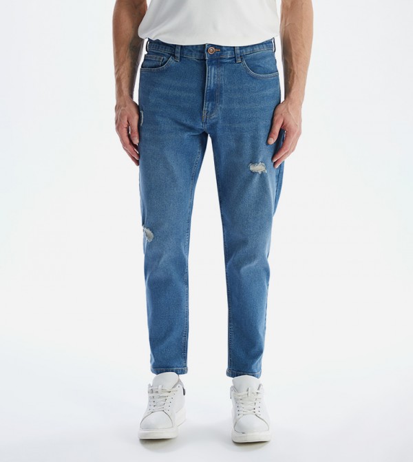 730 Ripped Mid Rise Carrot Fit Jeans