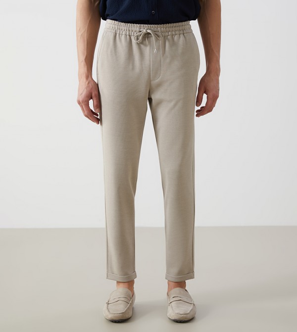 Solid Mid Rise Slim Fit Trousers