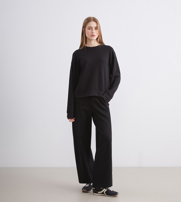 سويتشيرت اوفرسايز سادة كم طويل