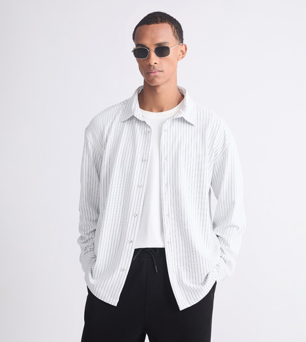 قميص مخطط كم طويل