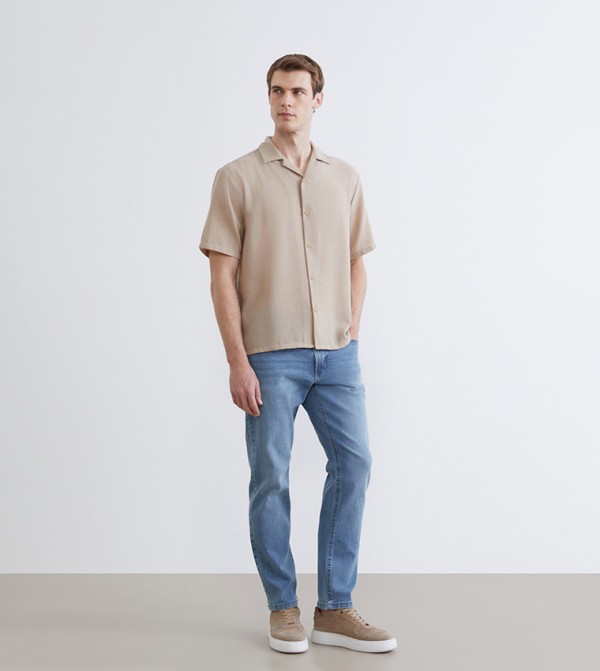 Washed Mid-Rise Jeans