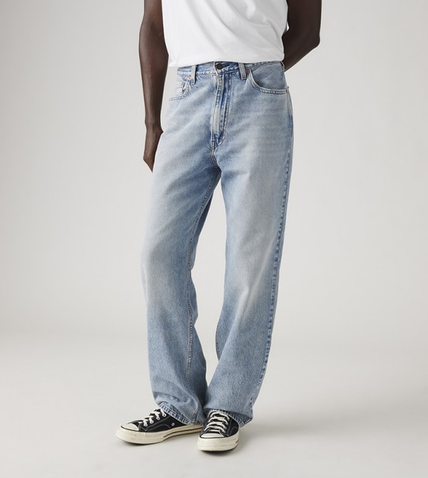 565™ Mid Rise Relaxed Fit Jeans