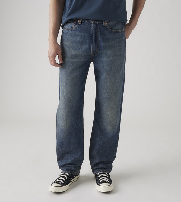 565™ Mid Rise Relaxed Fit Jeans
