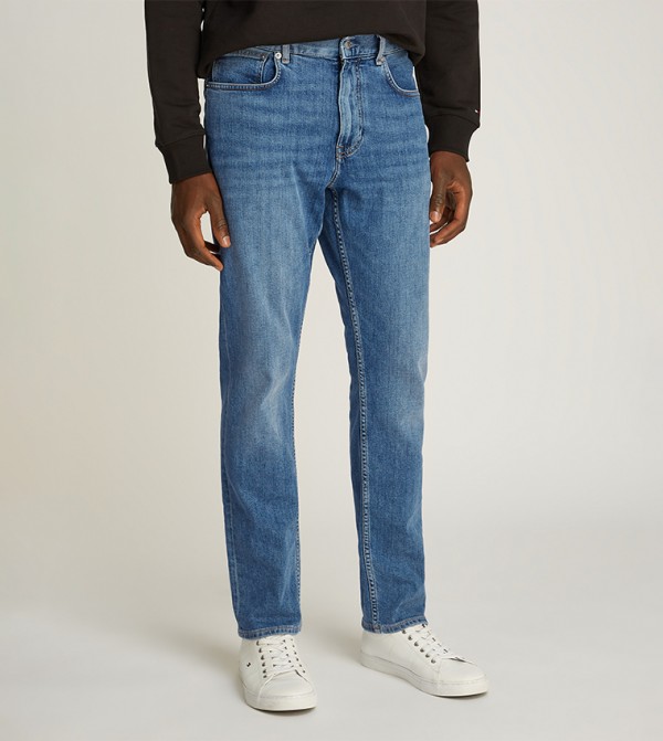 Washed Mid Rise Tapered Fit Jeans
