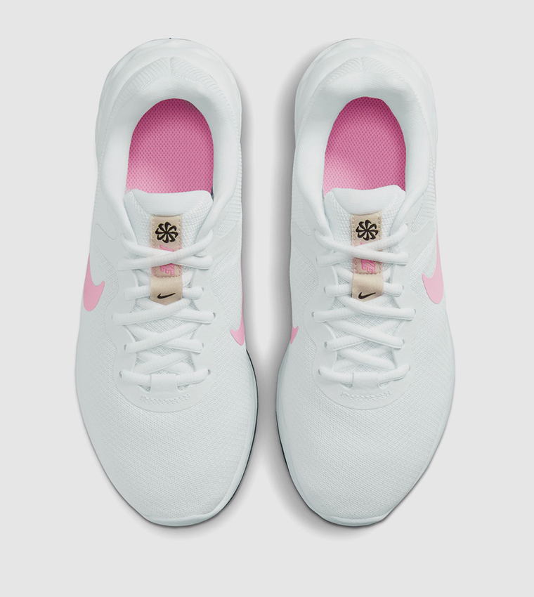 Pink and white nike running sales shoes