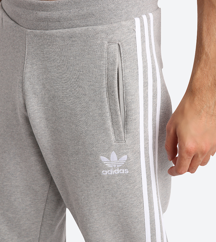 Buy Adidas Originals 3 Stripes Elastic Waistband Track Pants Grey DH5802 In Grey 6thStreet Kuwait