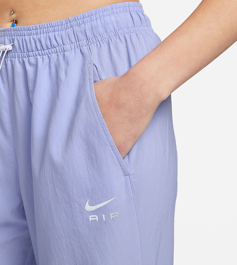 Buy Nike Women's Air Dri-FIT Running Pants Purple in Kuwait -SSS