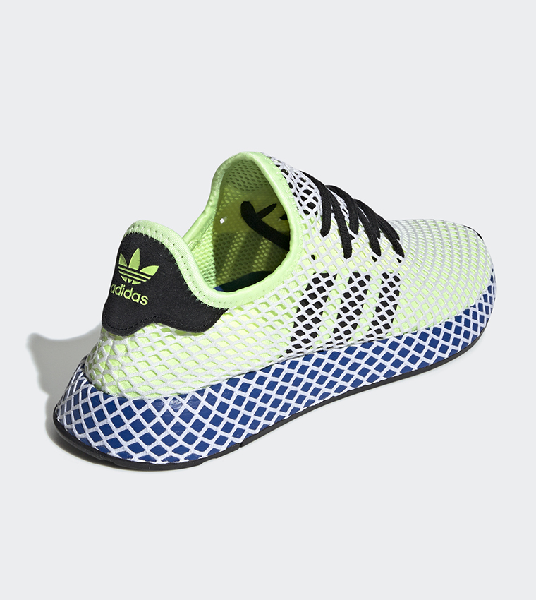 Buy Adidas Originals Deerupt Runner Shoes Hi Res Yellow Core Black Ftwr White In Black 6thStreet UAE