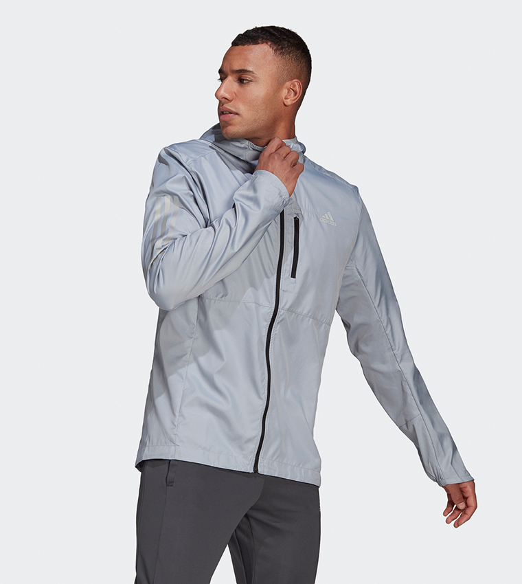 Buy Adidas Own The Run Hooded Wind Jacket In Silver 6thStreet Saudi Arabia